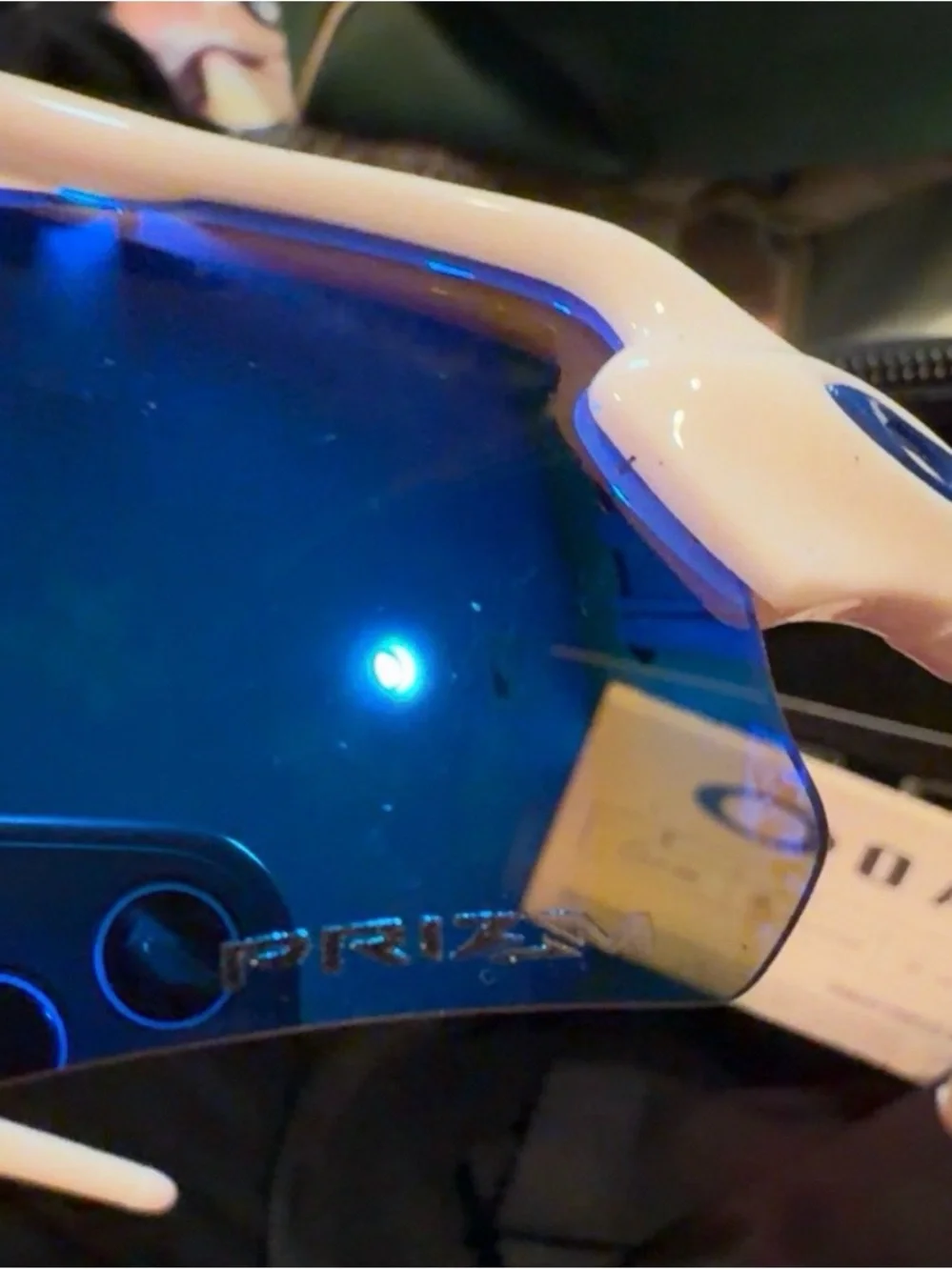 Oakley White Frame Sunglasses with Blue Mirrored Lens